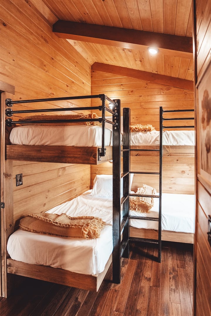 Close Off the Barn Door to Create a Private Bedroom with Double Bunks
