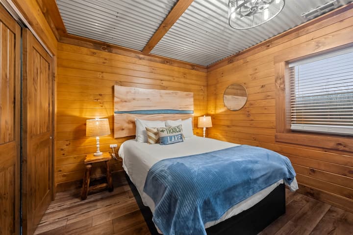 Lower Level Bedroom with Queen Bed & Bunkbed . Noise machine, Smart TV, ceiling fan.