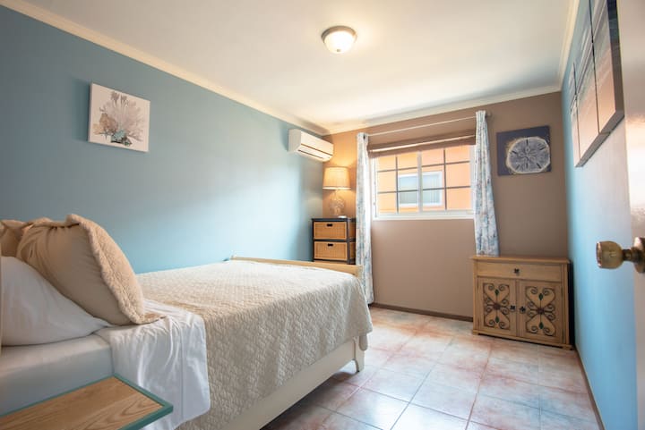 Relax in a light-filled room, perfect for unwinding after a day of adventure.