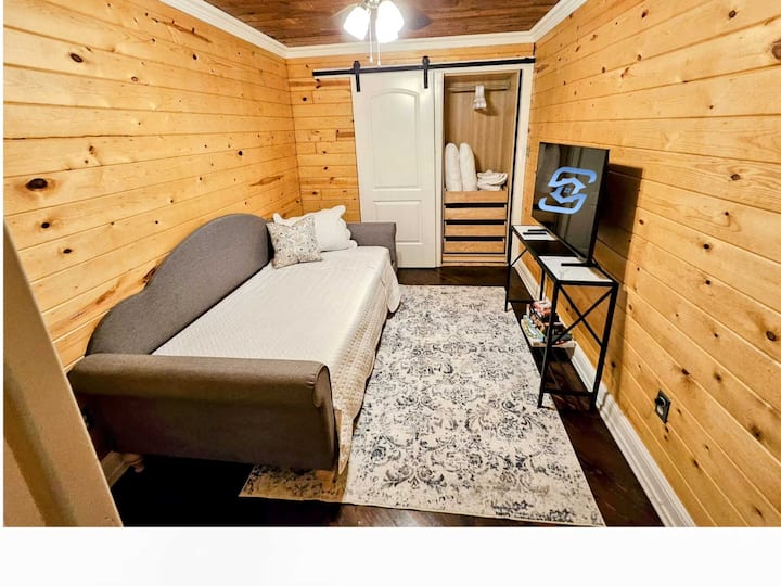 Third Bedroom with Twin Daybed, Memory Foam Mattress, Closet with Drawers & 43 inch TV including 100+ channels of Live TV streaming from YouTube TV + HBO