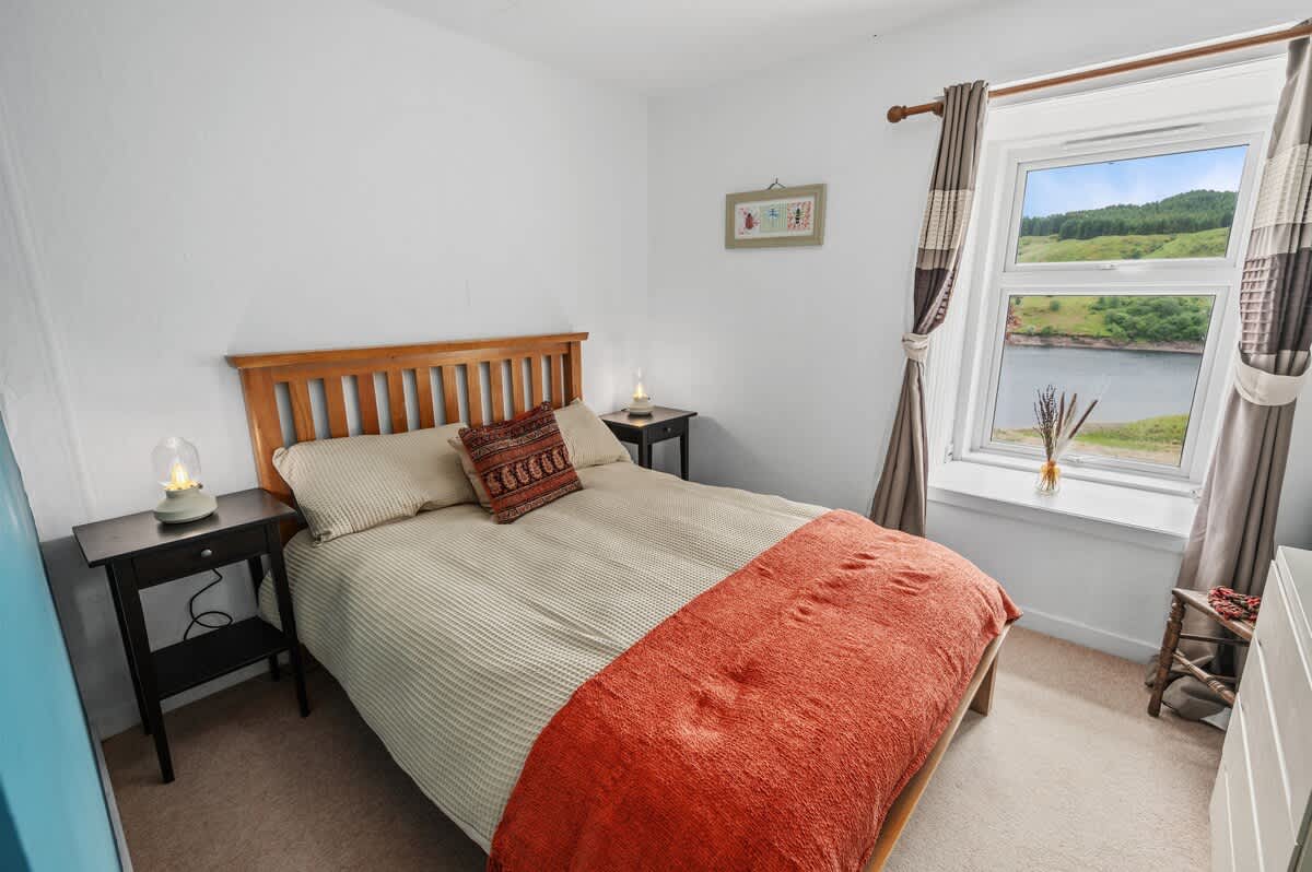 Habitación en la planta baja con vistas al lago en la parte delantera