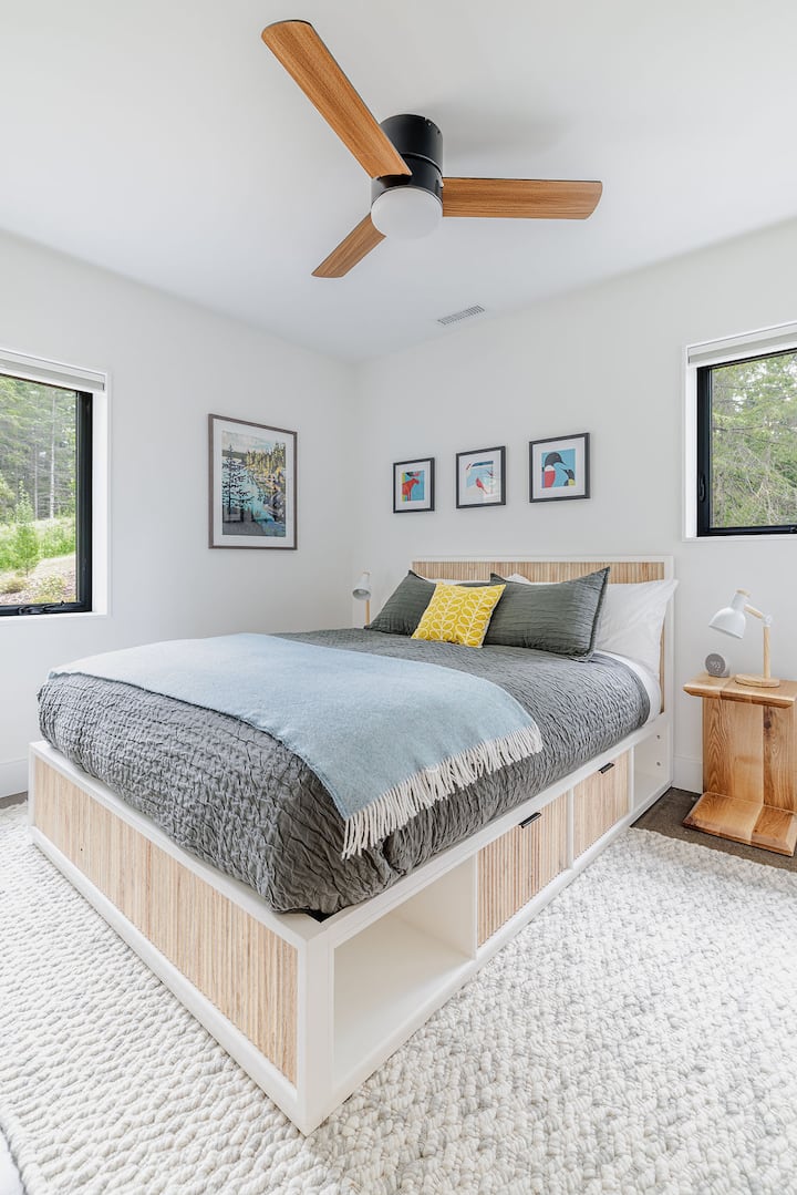 Right bedroom with queen bed and soft down alternative mattress topper. Blackout blinds on each window.
