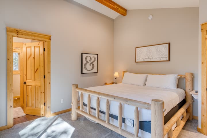 The primary bedroom features a king bed and an ensuite bathroom.
