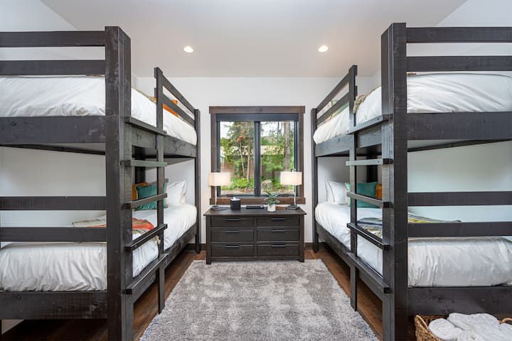 The twin bunk room is a fun space for the home`s younger guests.