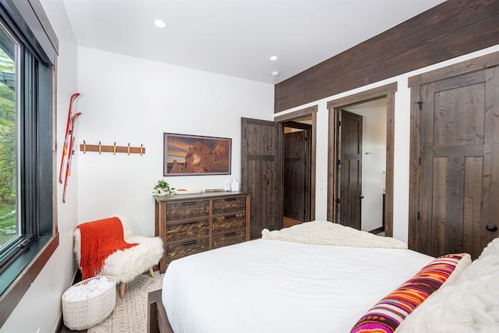 This thoughtfully decorated home features modern decor with a splash of color.