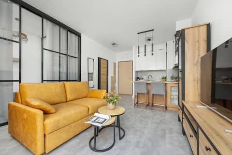 Successful Airbnb property: Stylish Apartment | Balcony and Garage Parking in Wilanów