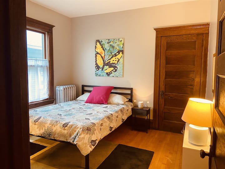 Cozy queen bed in Butterfly Room