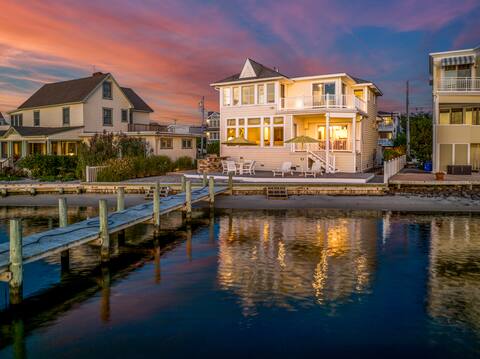 Stunning bayfront w/private bay beach and dock