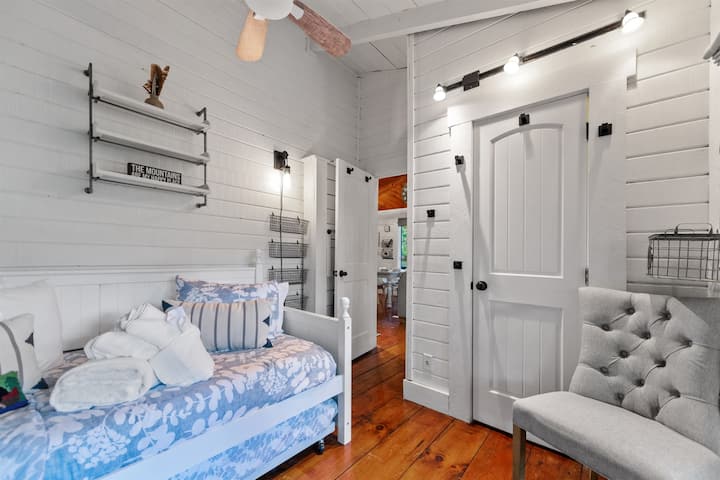 The second bedroom offers a twin bed with a trundle, ideal for accommodating the whole family.