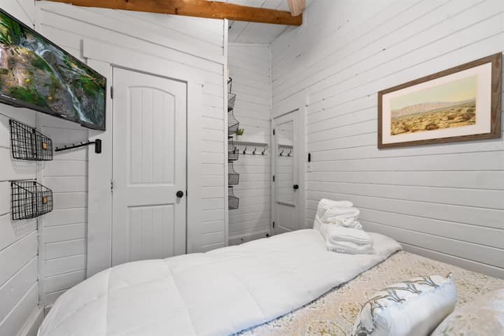 Rest easy in the luxurious king-sized bed, the perfect retreat after a day of adventure.