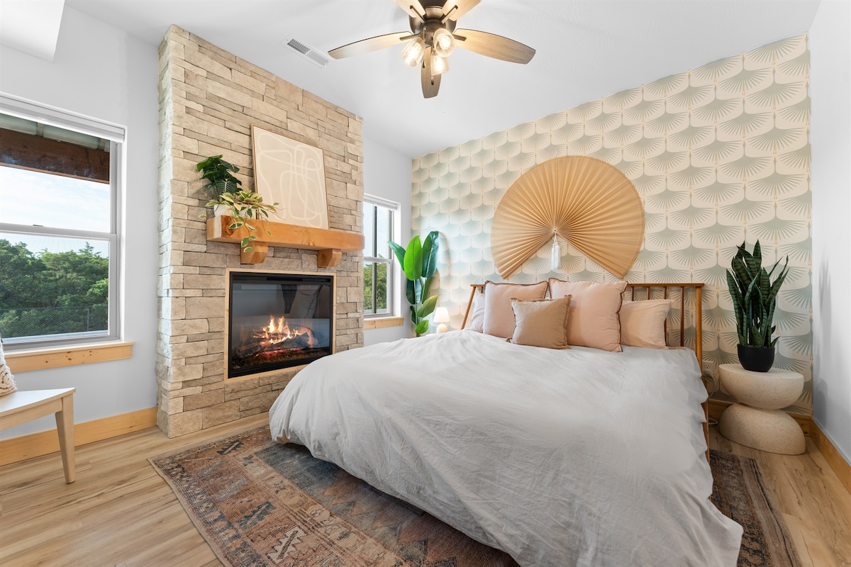 Experience top level comfort with our Master Bedroom with King-sized bed, its own fireplace & ensuite glass-enclosed shower