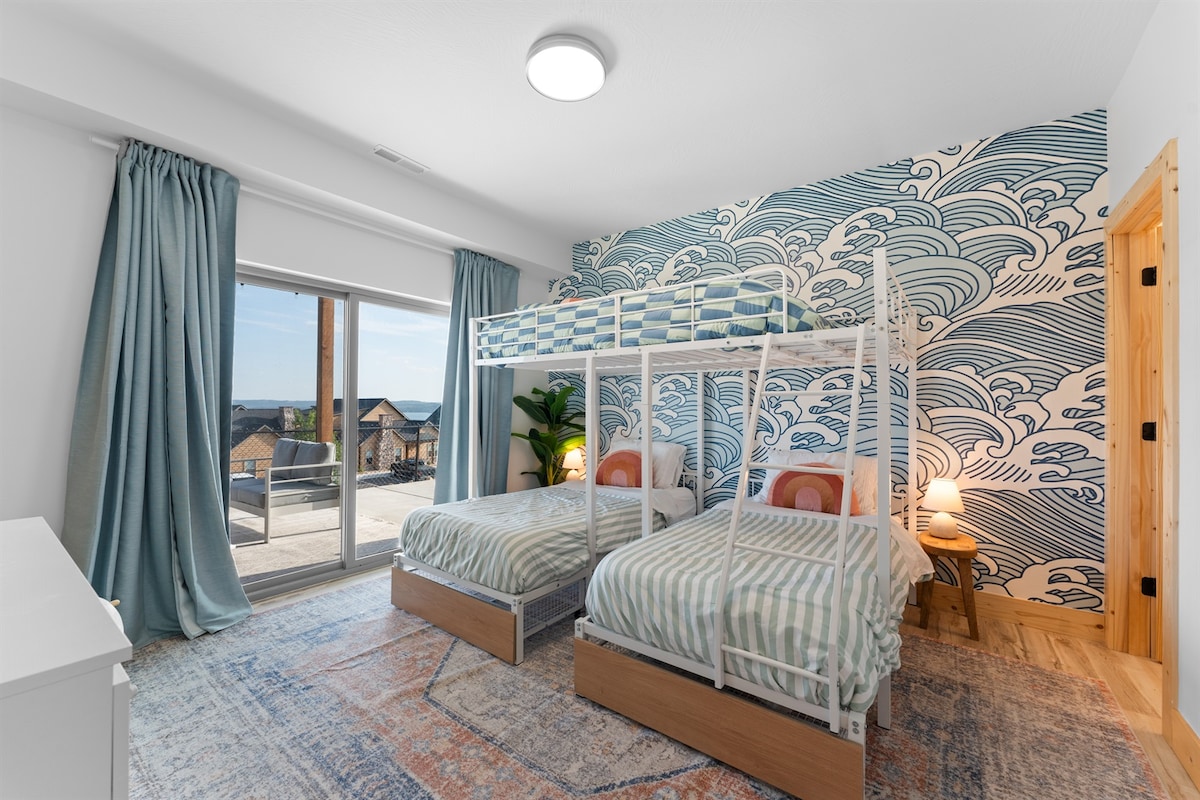 Fun bunkroom space for the young & young at heart. With 2 twin-sized bed & an Upper double-sized bed