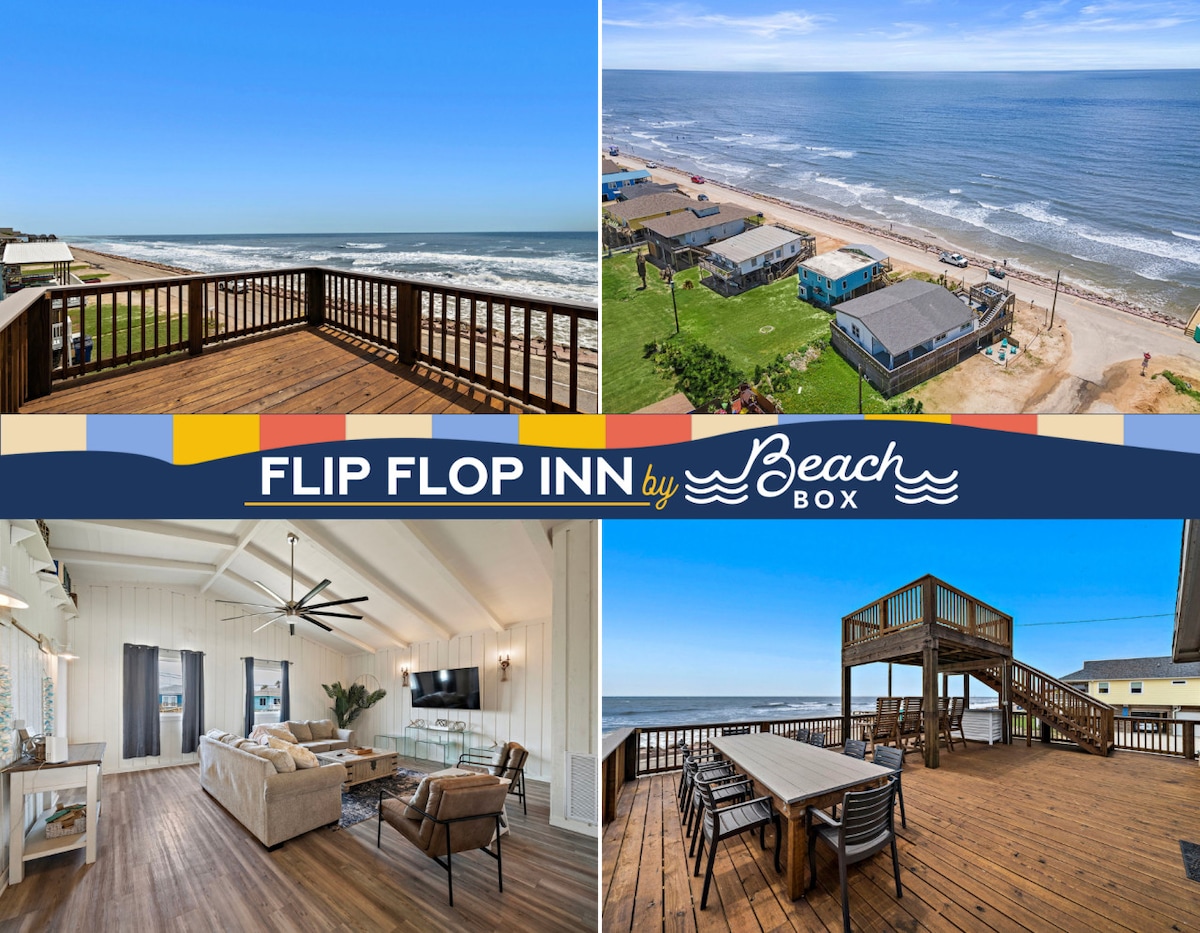 A spacious deck with wooden flooring overlooks the ocean, providing stunning views of the coastline and gentle waves. Adjacent, a cozy living area is filled with light from large windows, inviting relaxation with plush seating and a ceiling fan above.