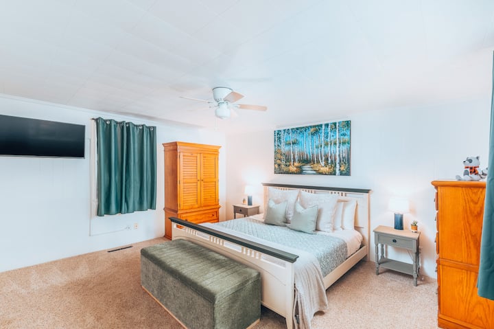 Enjoy spacious comfort in our bedroom.
