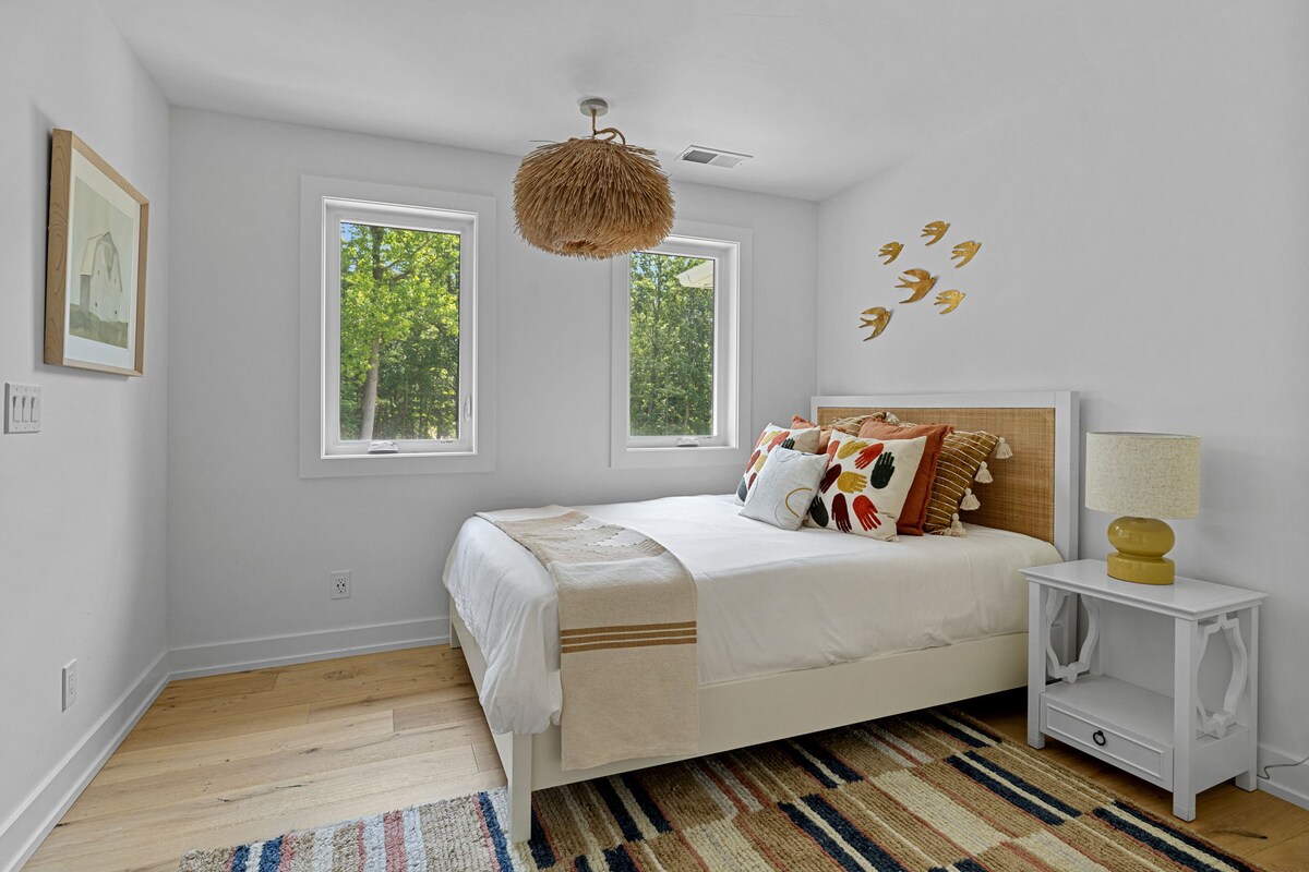 Bedroom 4 is on the main level & has a queen-size bed.