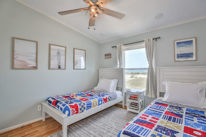 Twin bedroom with ocean views