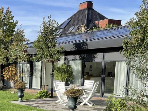 Luxury house and large garden in a wooded area