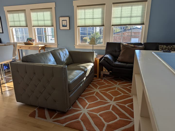 Cozy living area includes a full-sized futon.