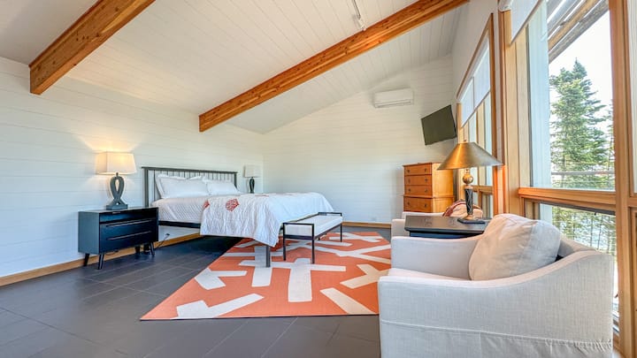 Bedroom 3 is located on the upper level above the garage.