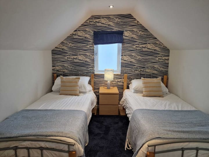 Útulná spálňa s oddelenými posteľami