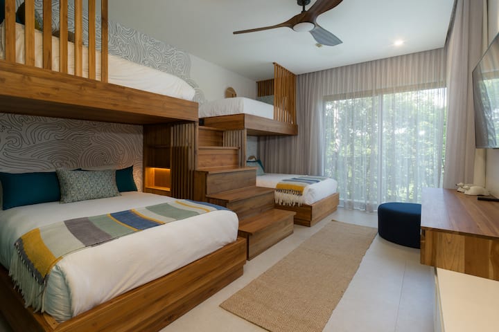 The bunk room the kids will claim as their own, and honestly, you might fight them for it.