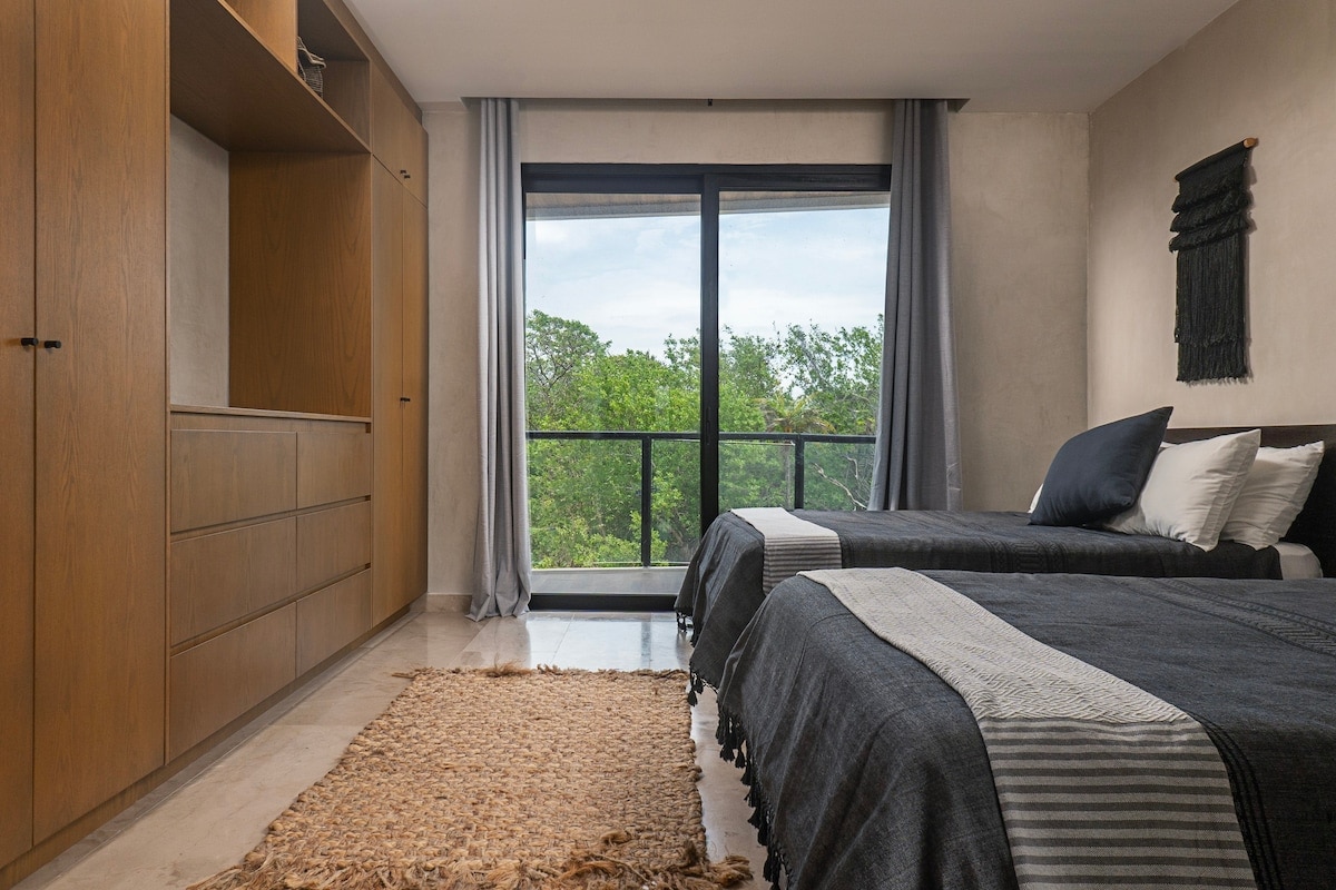 Druhá spálňa s dvoma pohodlnými posteľami.