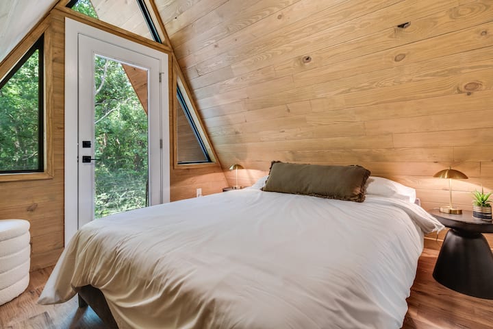 Second floor bedroom & private balcony.