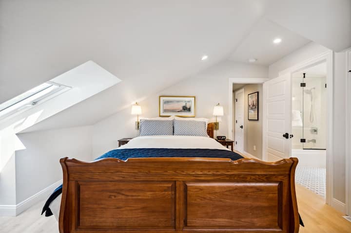 Our second floor Queen suite is cozy and private with it's own ensuite bathroom, Roku TV, built-in clothing storage, and closet.