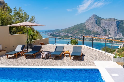 Casa Vita featuring a sea view, heated pool, sauna