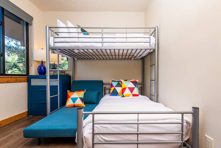 - Twin over full metal bunk with extra seating and bold pillows for the ultimate sleep and play zone
- Perfect for siblings, cousins, or friends to laugh, lounge, and rest in style
- Cozy mix of function and fun with room to spread out