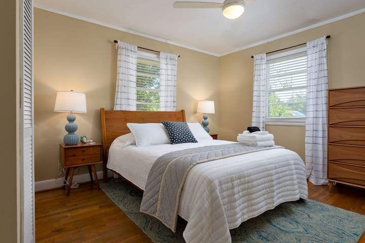 A 3rd Queen bedroom with private attached bathroom at the end of the hallway