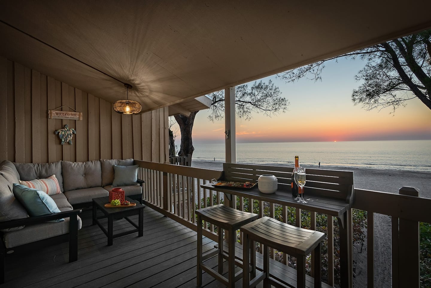 Private oceanfront balcony at golden hour