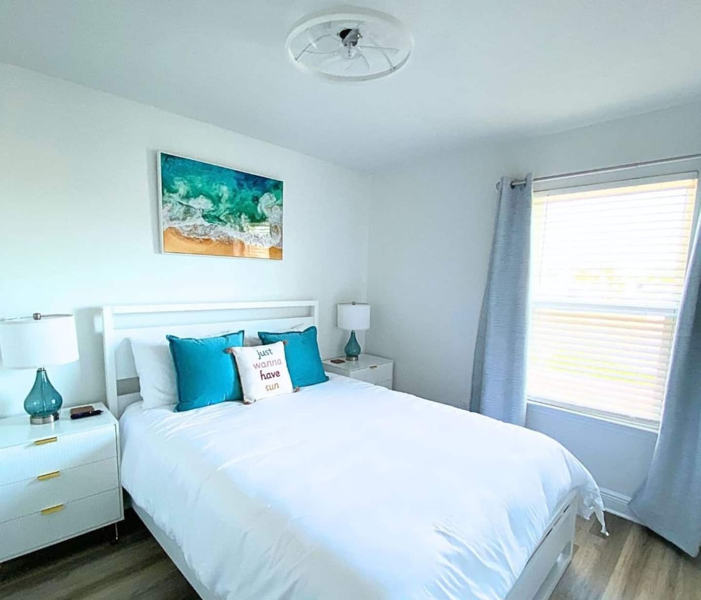 Enjoy Queen bed, 2 night stands w/drawers, 2 touch lamps with USB ports, room darkening shades, 40" Roku TV, ceiling light & fan, white…