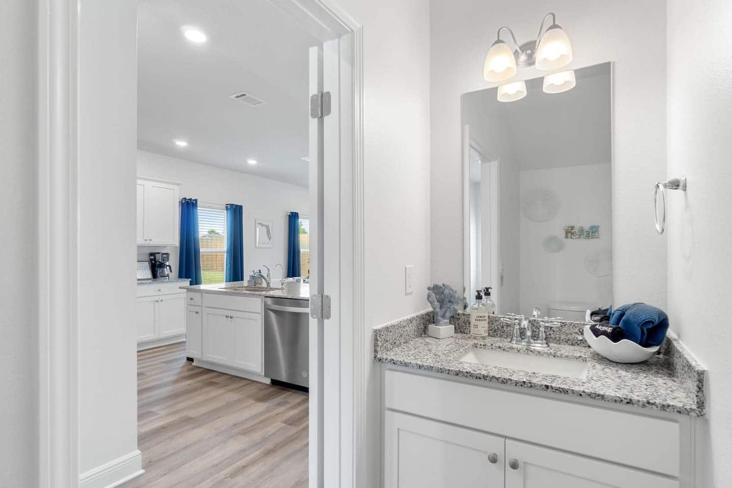 Chic & Modern Half Bath: sleek fixtures, a contemporary sink, and pristine finishes