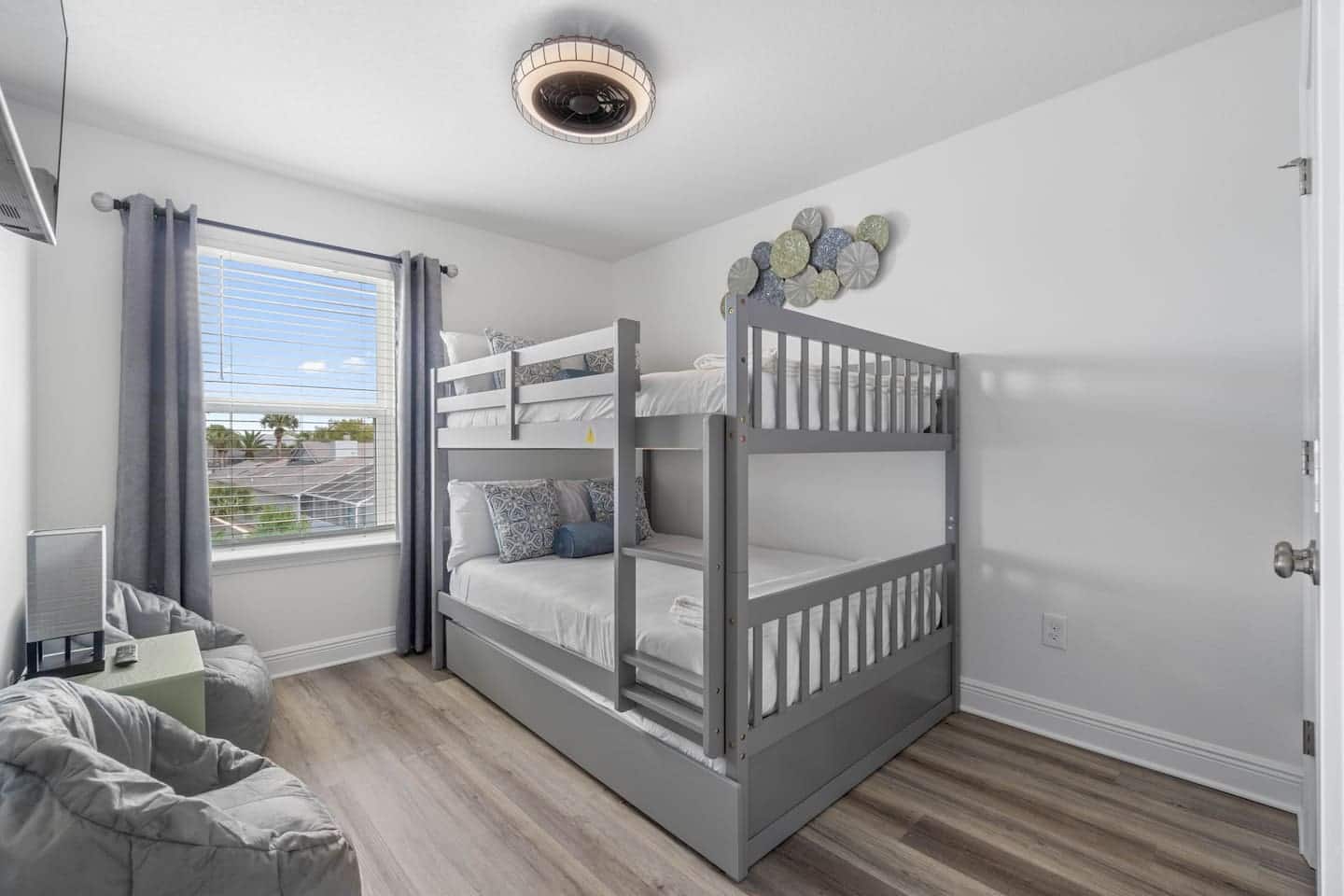 Full size bunk bed with the twin trundle (floor mattress) as the 3rd bed in the room