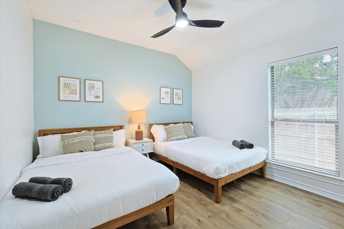 Gezellige kamer met twee queensize bedden