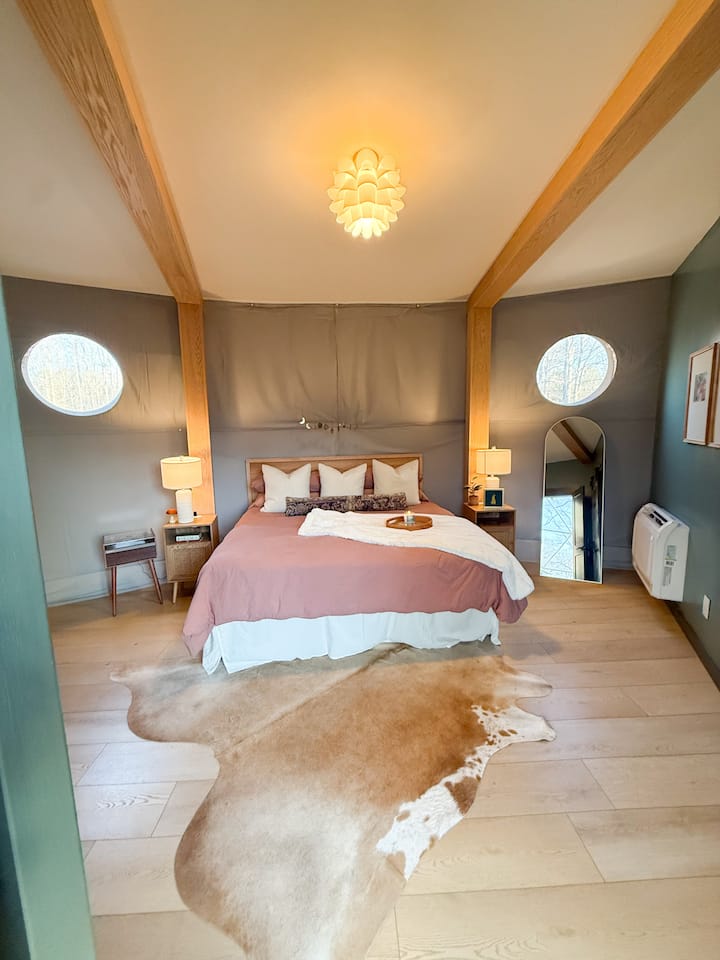 King bedroom with views inside the Lake Martin glamping dome