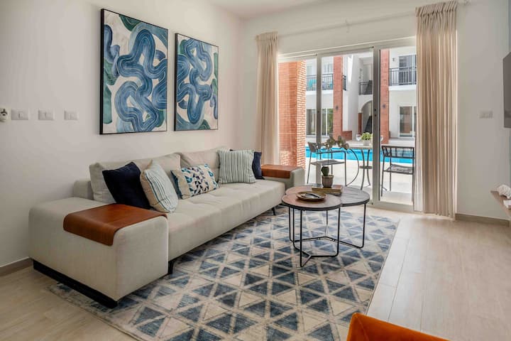 Stylish Pool Apartment Steps from the Beach