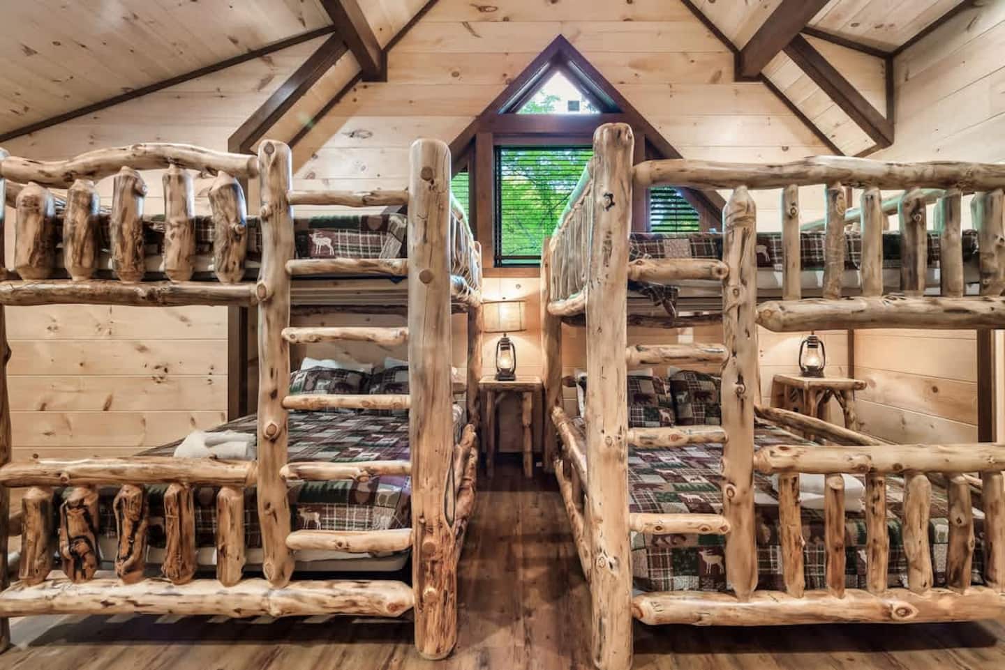 Bunk Room — queen-over-queen bunk beds, vaulted pine ceiling