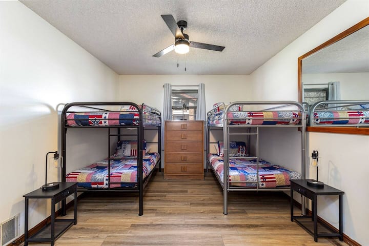 2 sets of Twin bunk beds in 3rd bedroom with door to ensuite bathroom.