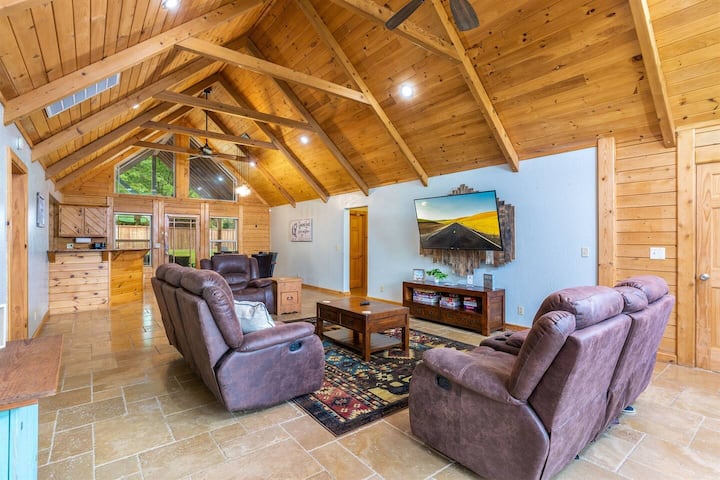 Open Living area with Dining and kitchen in the center of the home with Smart TV