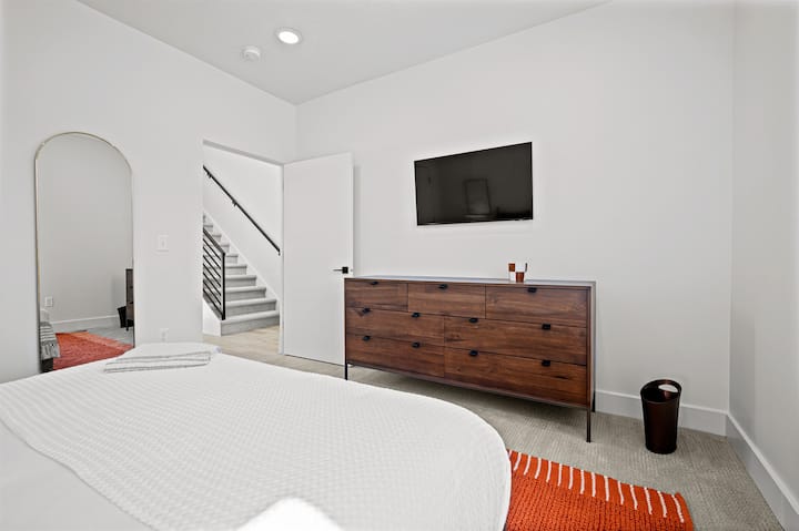 Enjoy streaming your favorite shows with plenty of storage space and natural light in the second bedroom.
