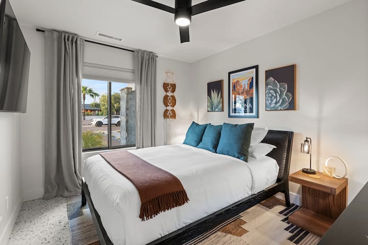 Charming bedroom with a queen bed and stylish accents.