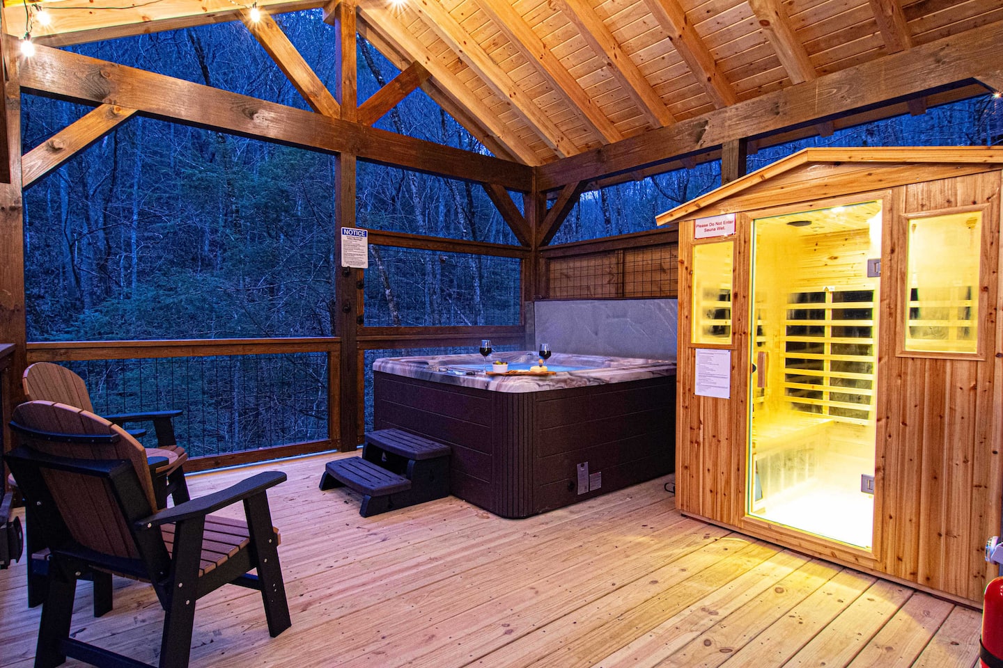 Rustic Lodge Retreat cabin and gazebo pavilion at dusk
