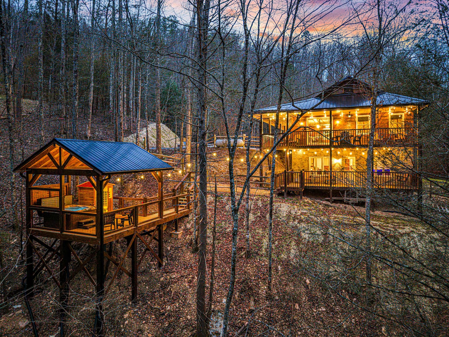 Private sauna glowing at dusk on the timber-frame pavilion