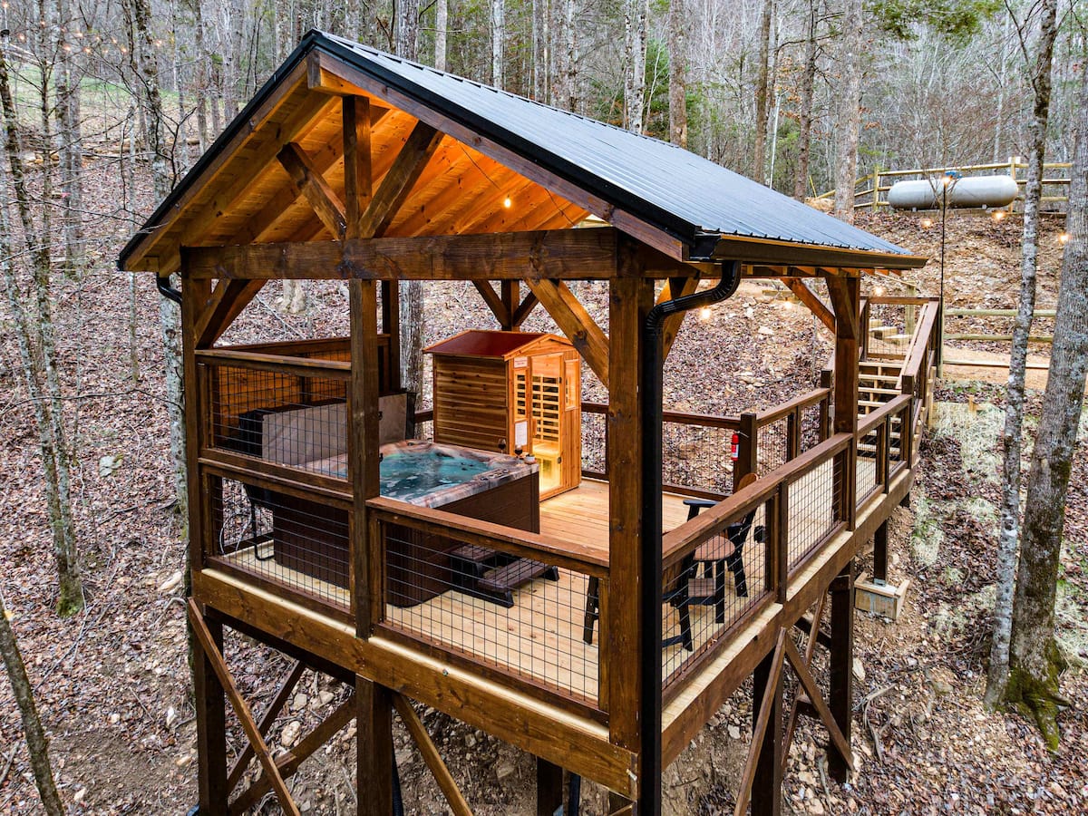 Rustic Lodge Retreat — creekside cabin with hot tub and sauna