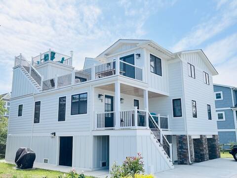 New listing just steps to the beach!