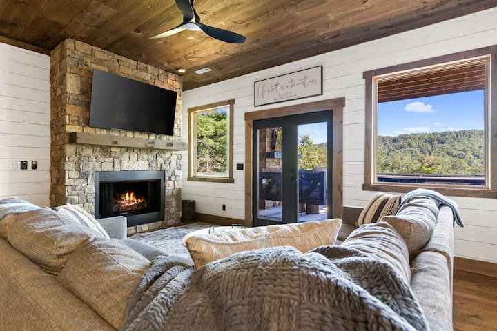 Family Room  with smart TV & Fireplace is open to game room area. Our TVs are equipped with YouTube TV and NFL Sunday Ticket!