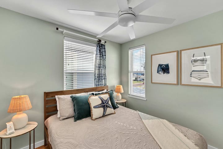 Please Note: This room has recently been upgraded from a queen to a KING bed for added comfort. The photos have not yet been updated to reflect this change. The bedroom also includes a TV, luggage rack, closet, and phone charging station.