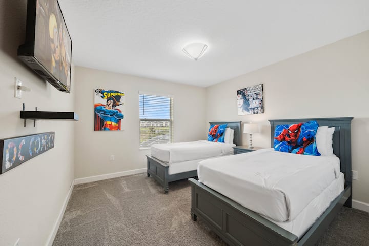 A Touch of Whimsy: This twin bedroom combines fun colors and unique accents, making it a delightful retreat for guests.